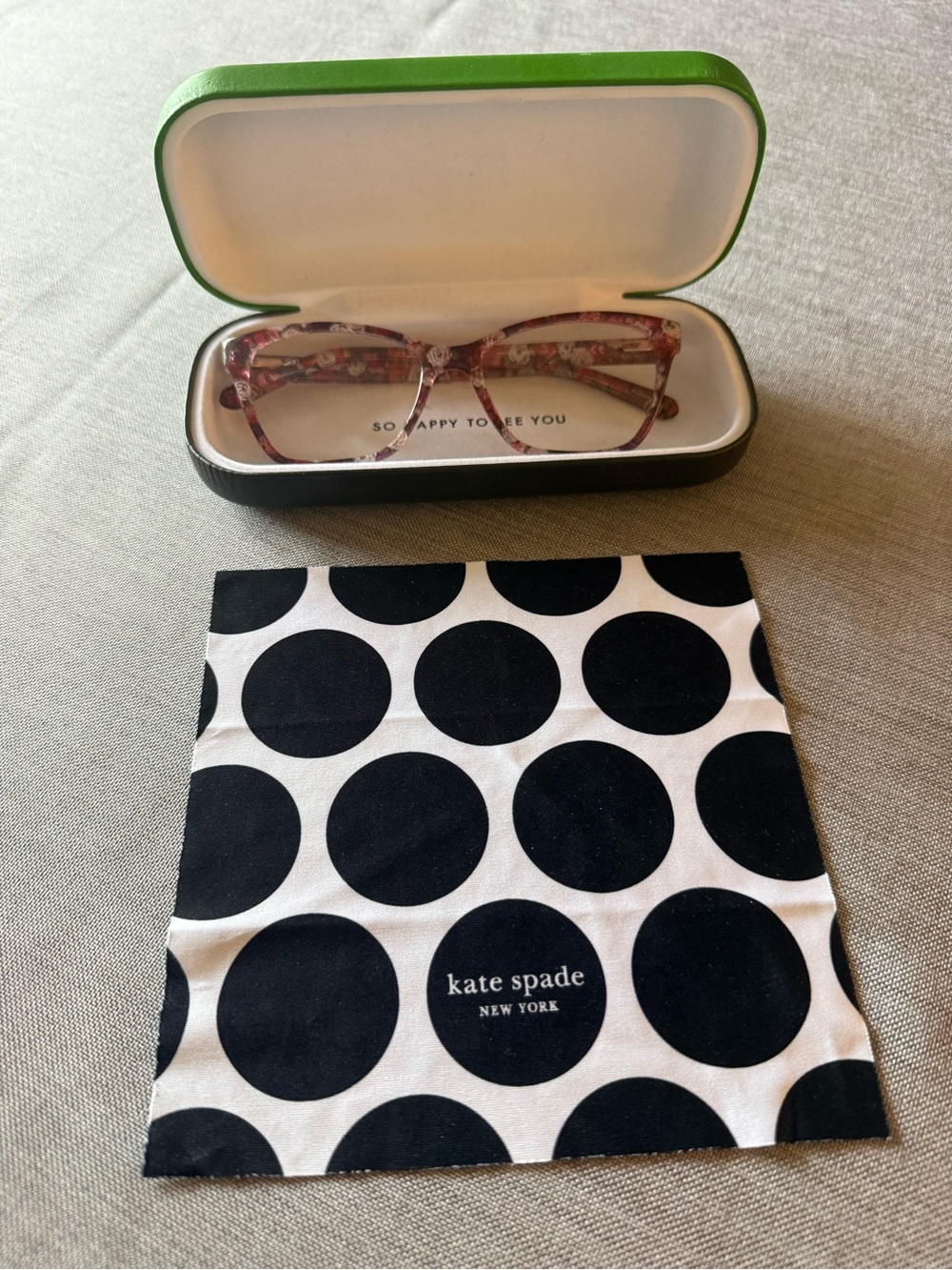 Kate Spade pink floral reading glasses with polka dot cloth and hard case
